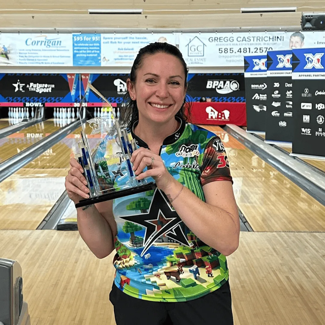 Stefanie Johnson holding the trophy after winning the PWBA Rochester Open at ABC Gates Bowl in Rochester, New York.