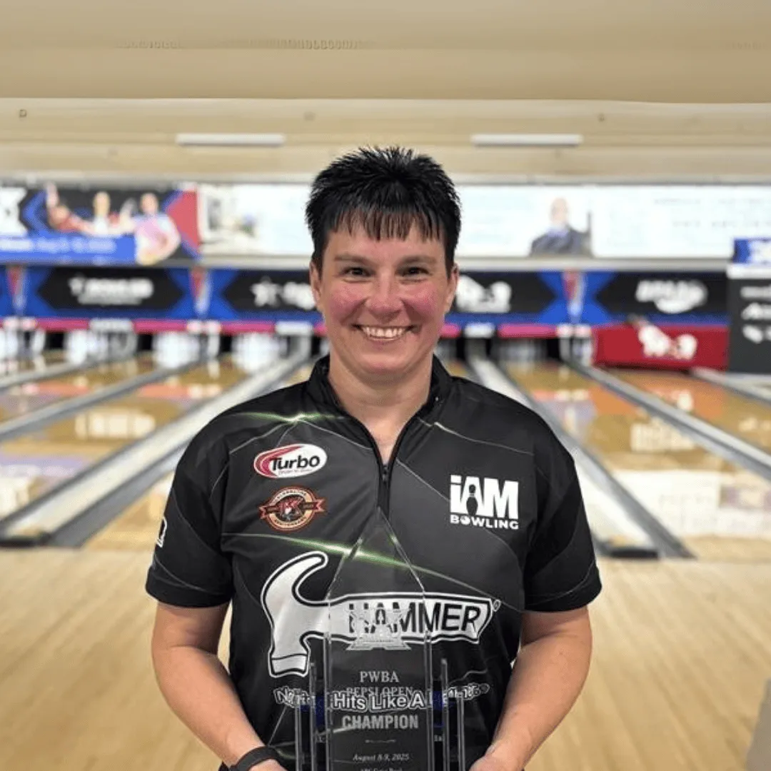 Shannon Pluhowsky holding the trophy after winning the PWBA Pepsi Open in Rochester, New York.