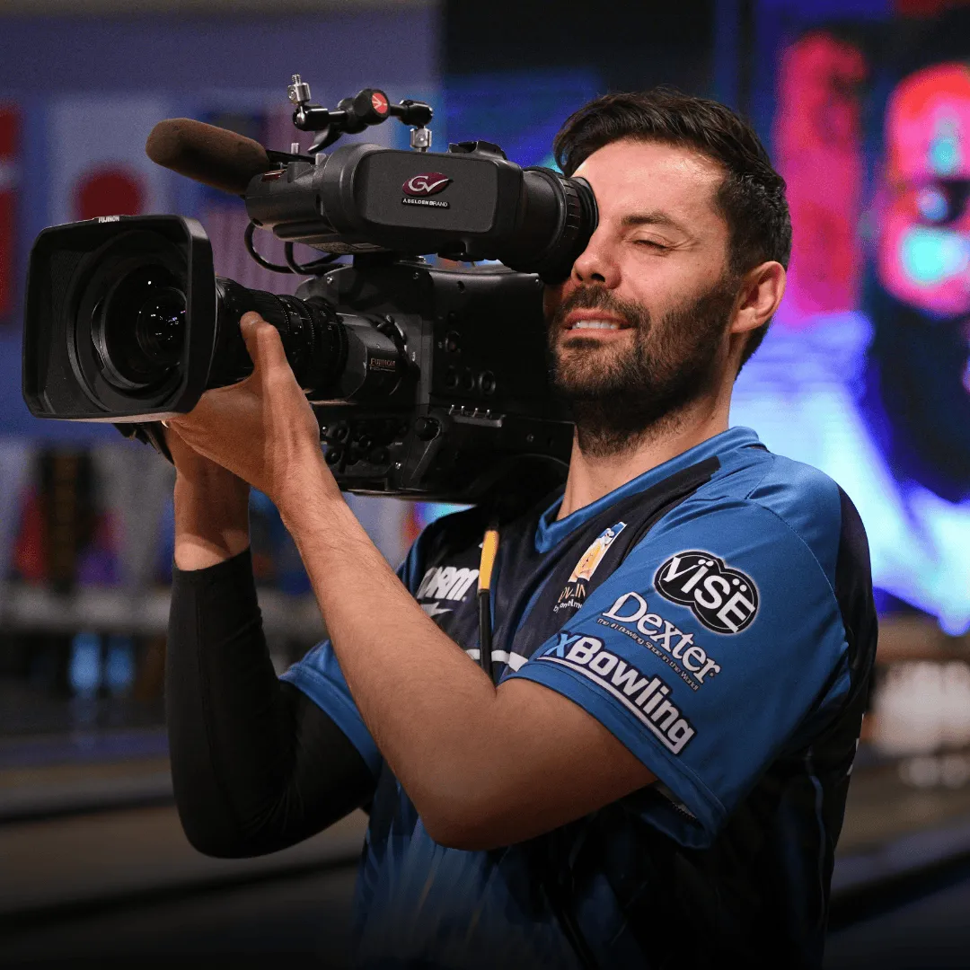 Professional bowling player Jason Belmonte with the camera featured in HBO’s Born to Bowl documentary series about the PBA Tour.