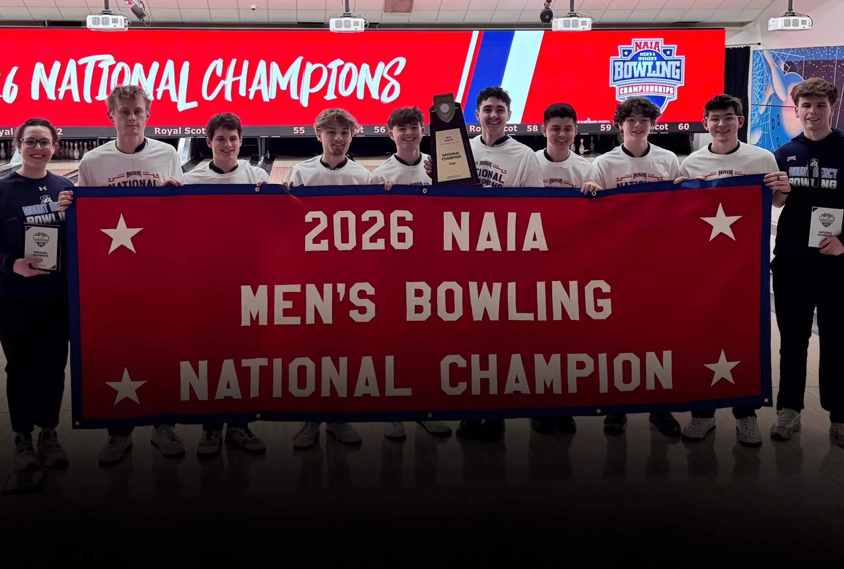 2026 NAIA Men's Bowling National Championship logo with Mount Mercy Mustangs celebrating the win.
